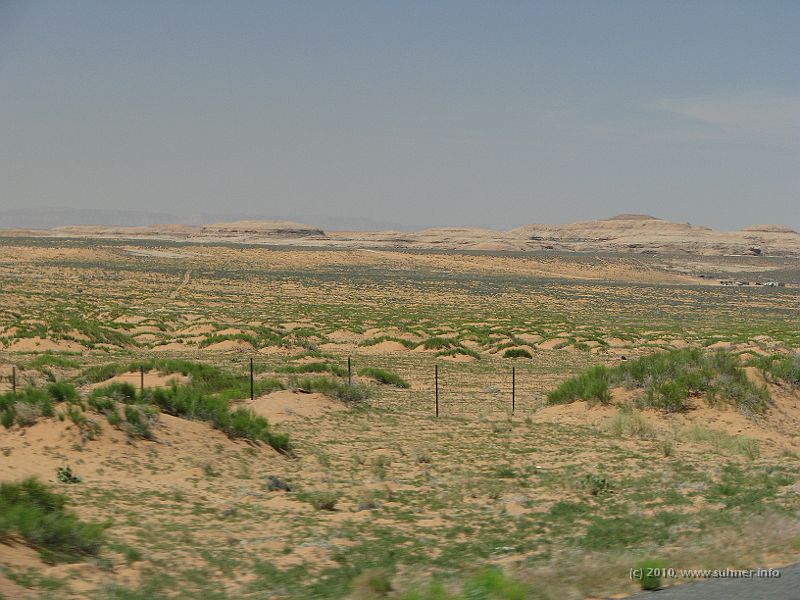 IMG_1434.jpg - Nearly flat, hot, dry, sandy, windy area out here!