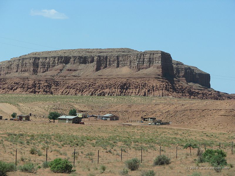 IMG_1450.jpg - Another rock, accompanied by another few huts